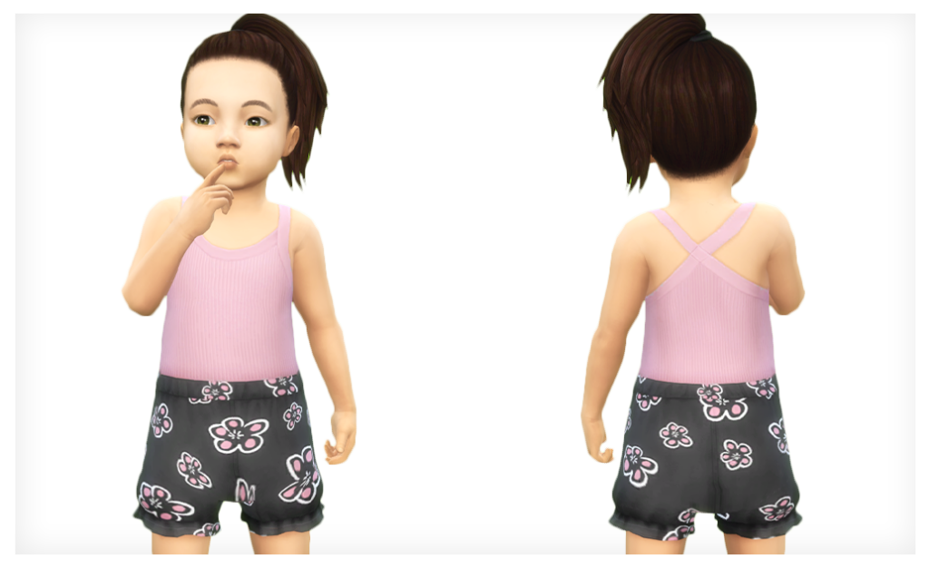 Un Sim señala hacia su boca mientras lleva puesto un top de tirantes cruzados y shorts florales, una opción perfecta para atuendos personalizados de Sims 4