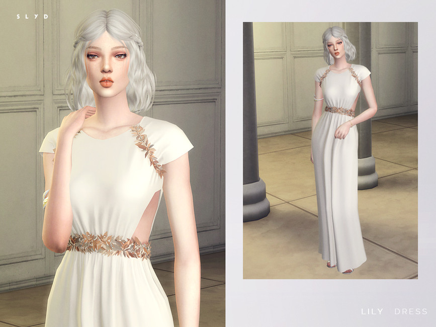 Este vestido es muy sencillo, con una manga corta de camiseta con detalles metálicos que van desde la axila hasta el cuello, también tiene recortes en los costados y un hermoso cinturón en esos mismos detalles metálicos